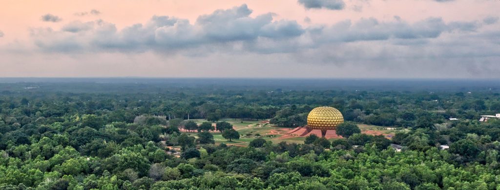 View of the Matrimandir and surrounding trees from a high elevation