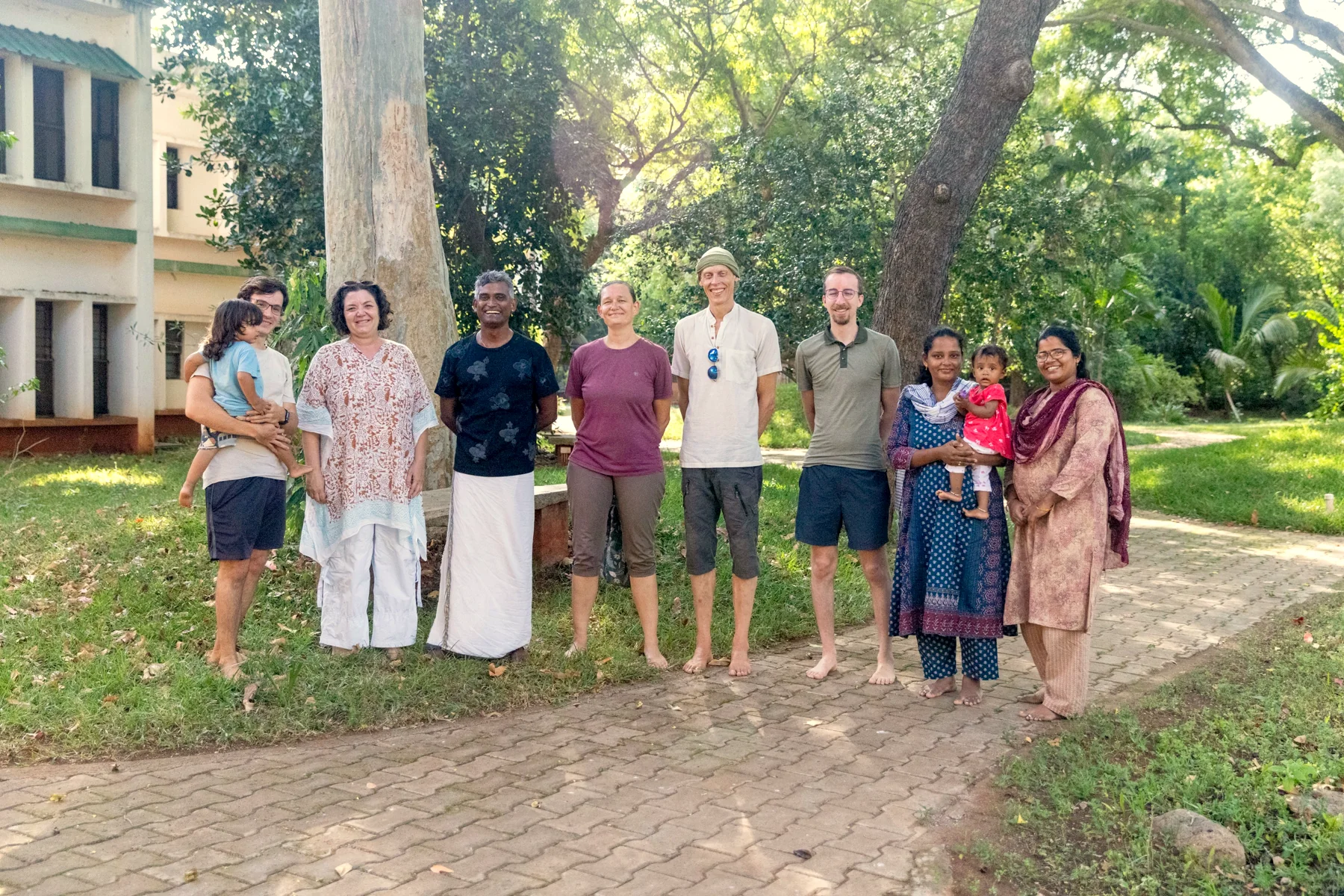 The AVI USA team and the MorningStar team standing together under the trees