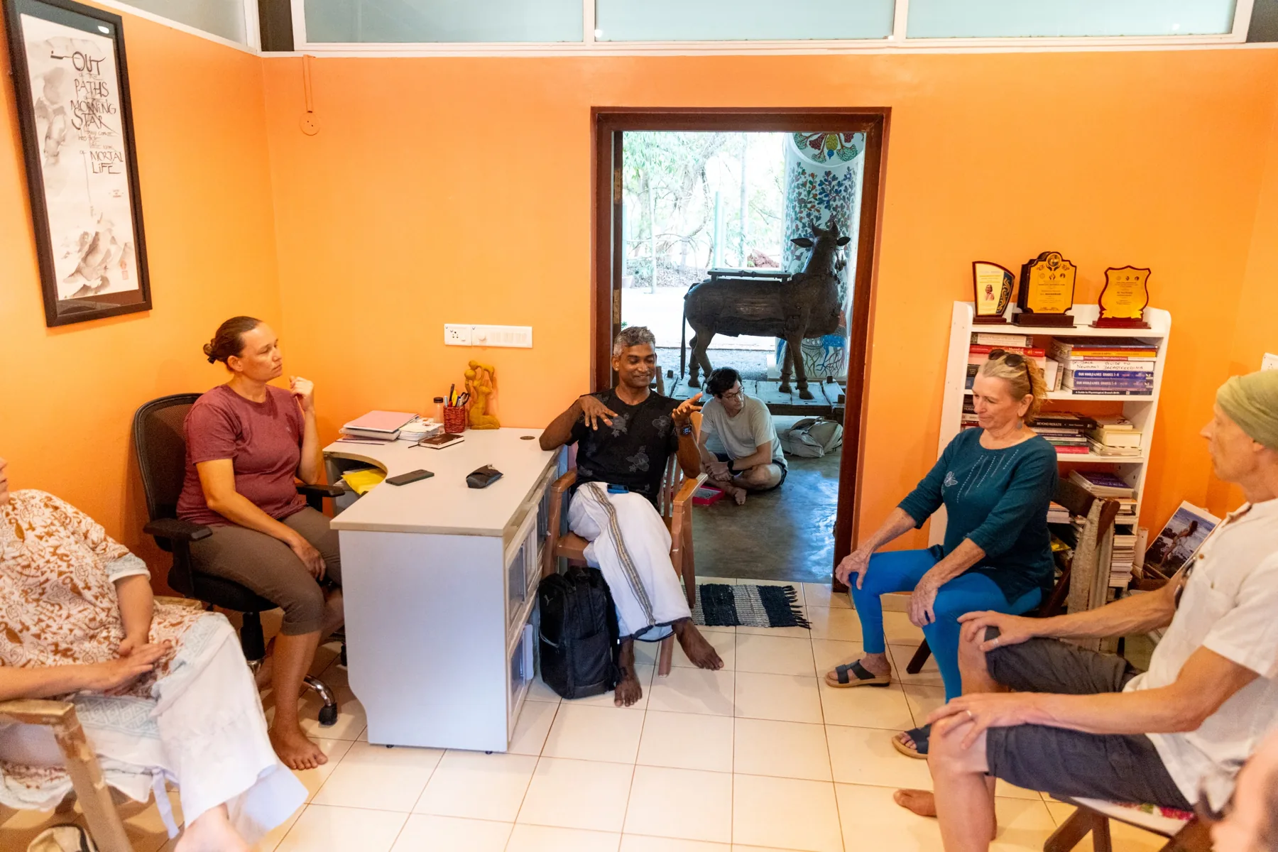 The MorningStar team in conversation with visitors in their office