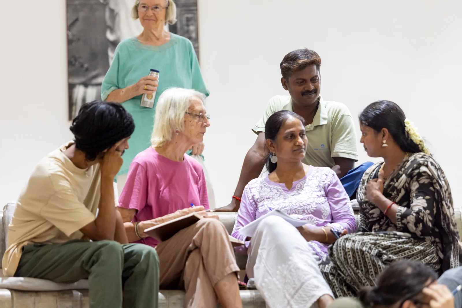 Partners in conversation at the AVI USA partner gathering at Savitri Bhavan