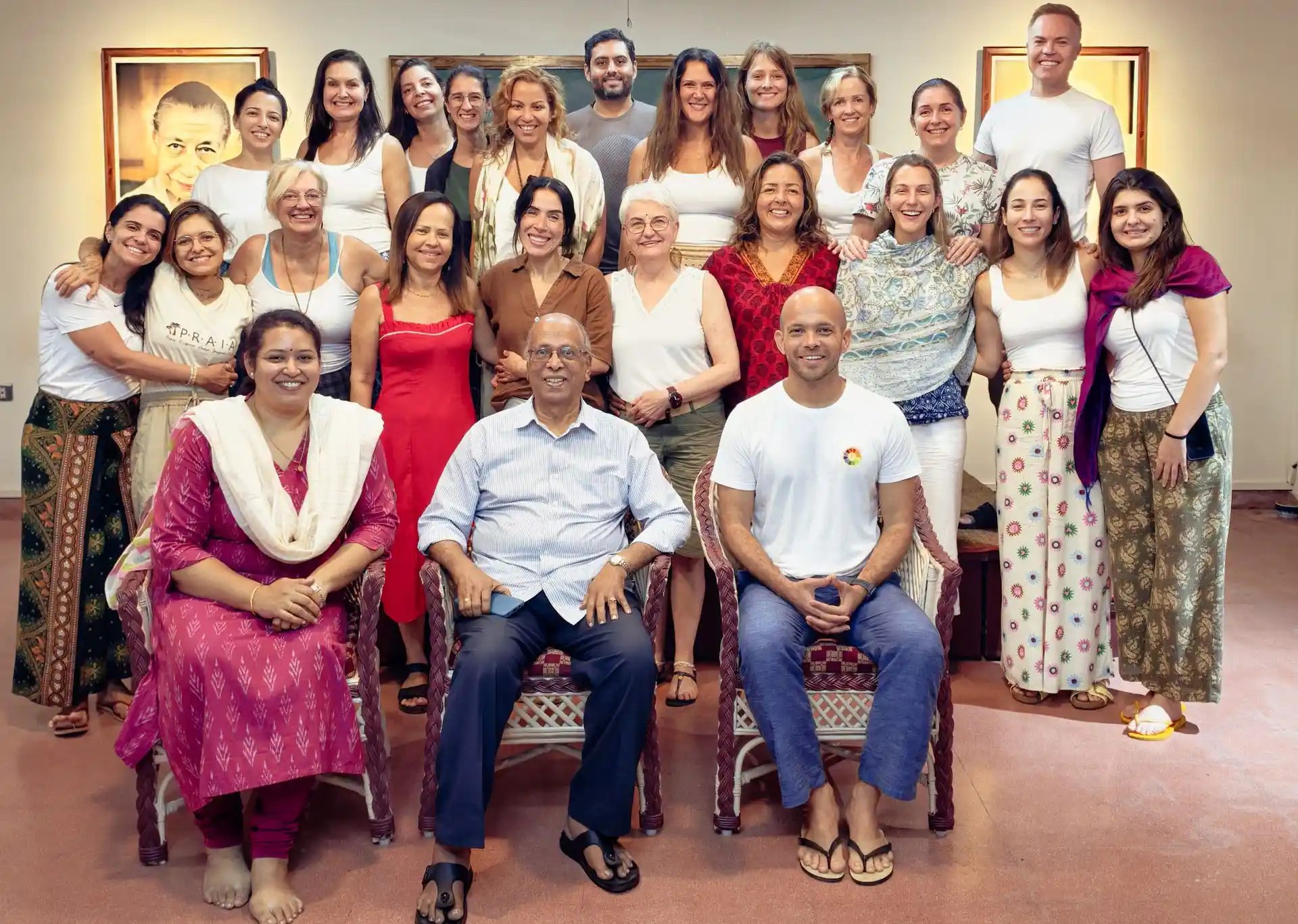 Dr. Ananda Reddy teaching in front of a group of students